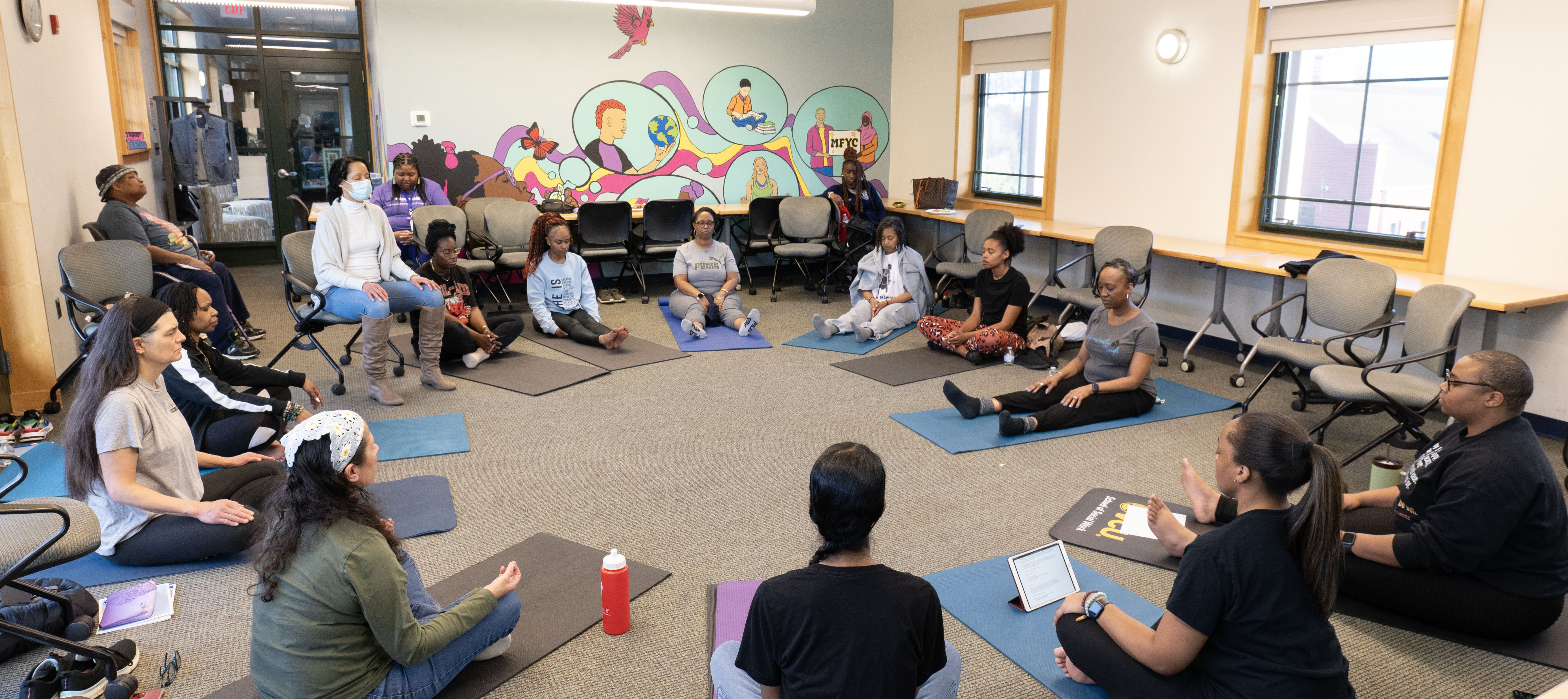 Group Circle of People Meditating